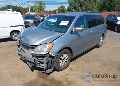 2010 Honda Odyssey Ex z USA, uszkodzony, nr VIN 5FNRL3H48AB038702